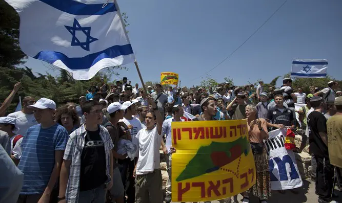 Israelis march in Judea and Samaria