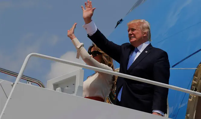 President Donald Trump and first lady Melania Trump board Air Force One